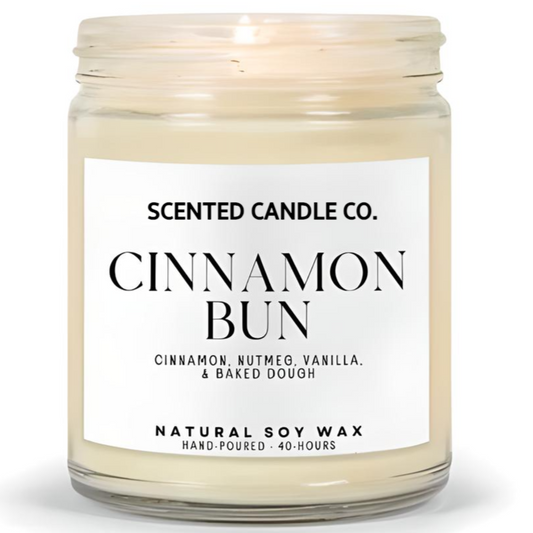 cinnamon bun scented vegan friendly soy candle in clear jar