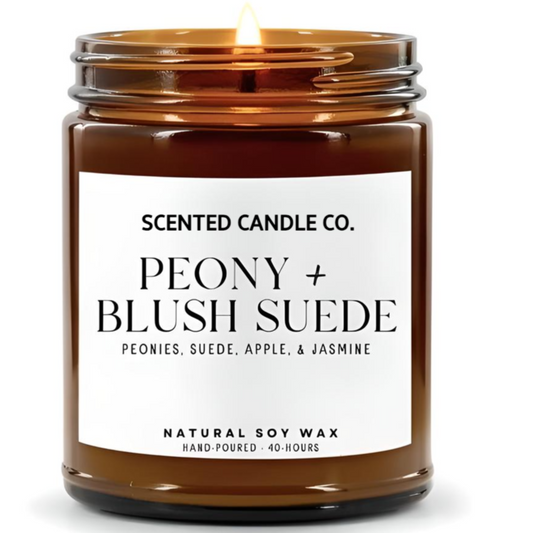 peony and blush suede scented vegan friendly soy candle in amber jar